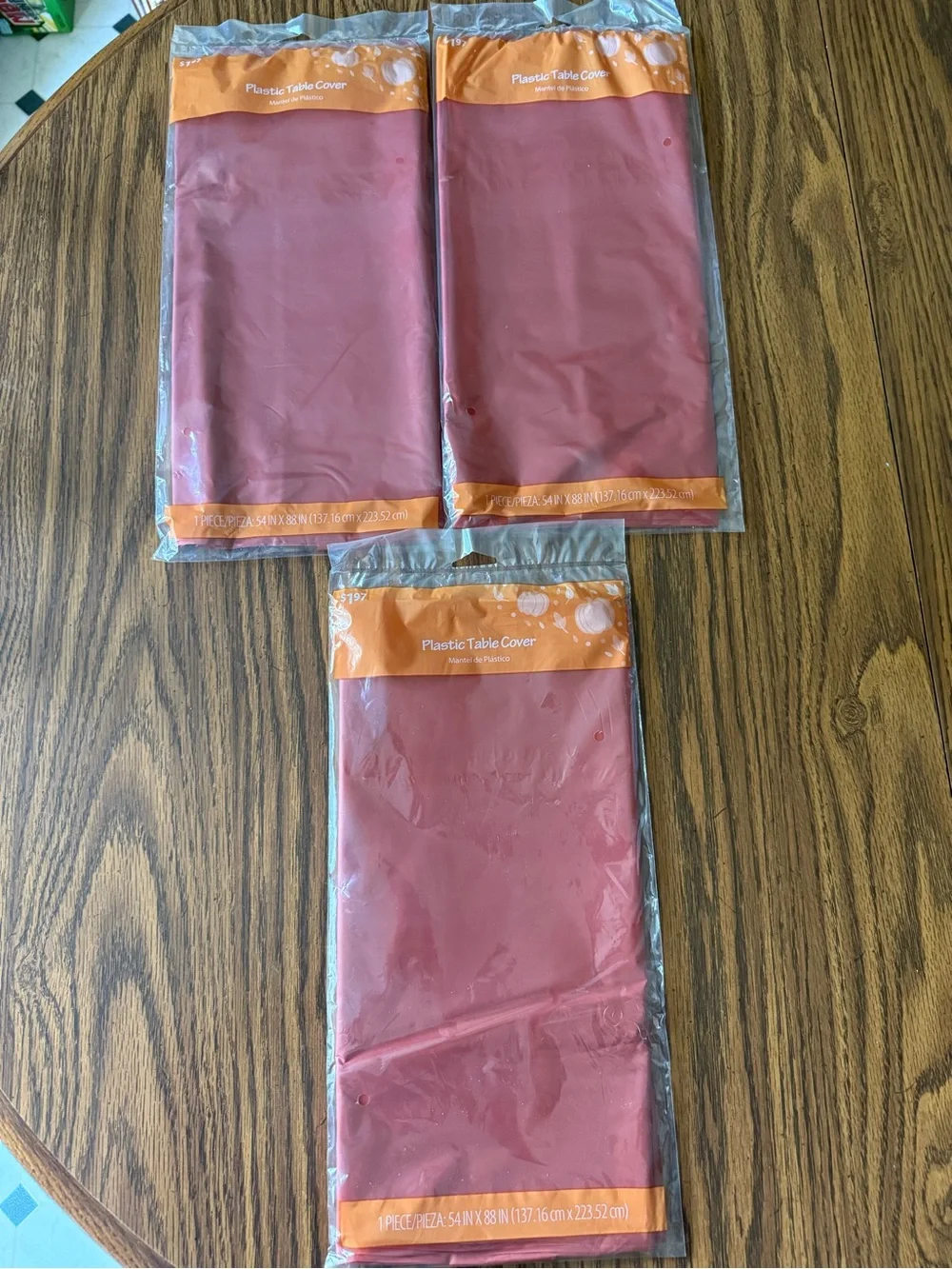 3 rust colored table covers